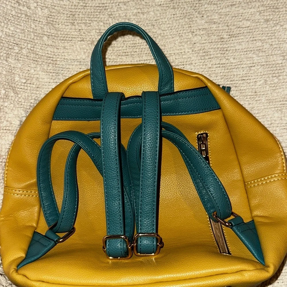 UEC MONTANA WEST Backpack Purse Anti-Theft Backpack with secured zipper & tassel